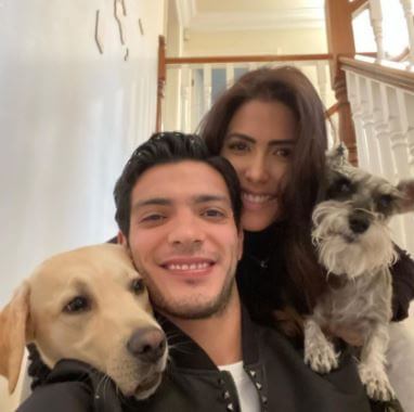 Arya Jimenez parents Raul Jimenez and Daniela Basso with their dogs.
